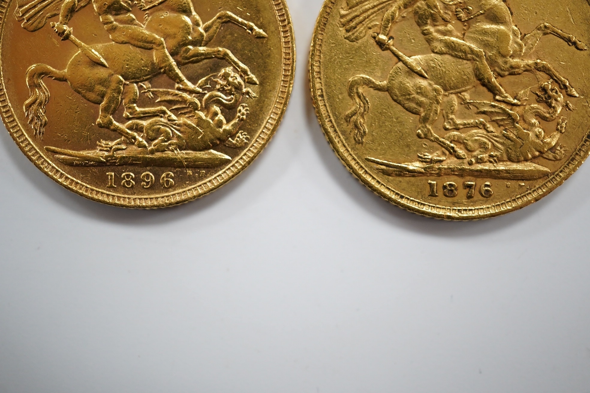 British gold coins, Victoria, two gold sovereigns, 1876, near fine and 1896, fine or better (2)